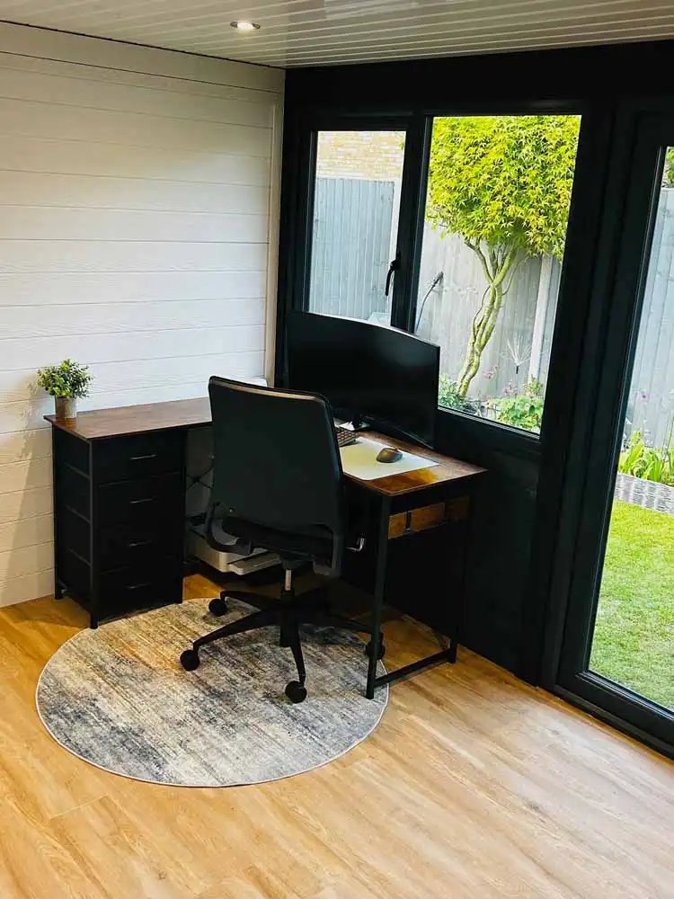 Composite garden office set up as a professional work-from-home space