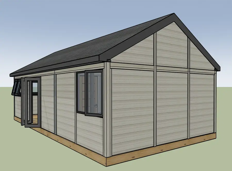 Rear exterior view of a garden annexe with gable roof and loft