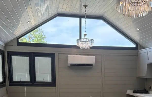Glazed gable end seen from inside an annexe