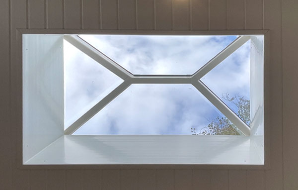 Aluminium roof lantern seen from inside a garden room