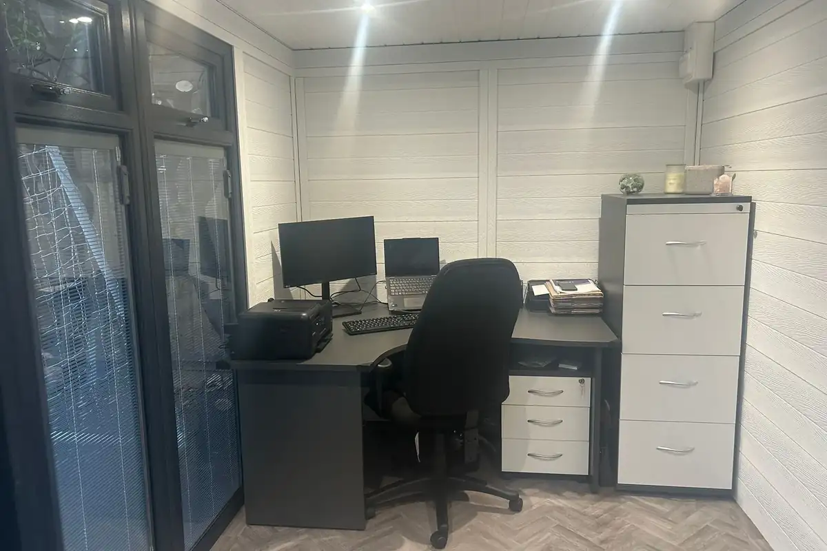Composite garden office with desk and filing cabinet